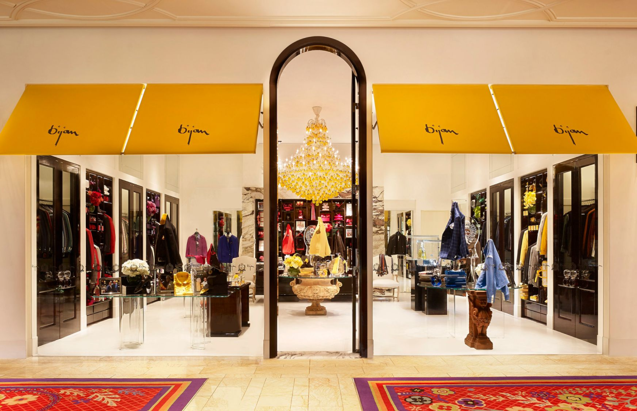 a clothing store with a chandelier and a chandelier