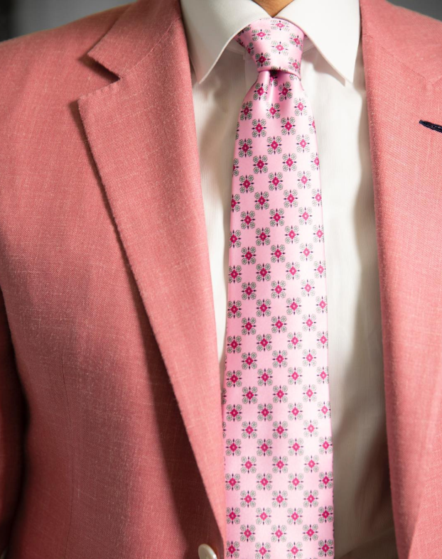 Image of pink suit, tailoring options available contact bijan@bijan.com for more information