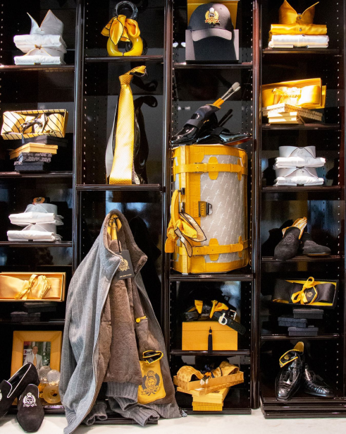 a shelf filled with lots of yellow and black items